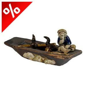 KERÁMIA FIGURA CSÓNAKOS KORMORÁNNAL