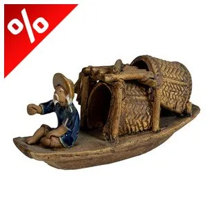 KERÁMIA FIGURA CSÓNAK ELEJÉBEN